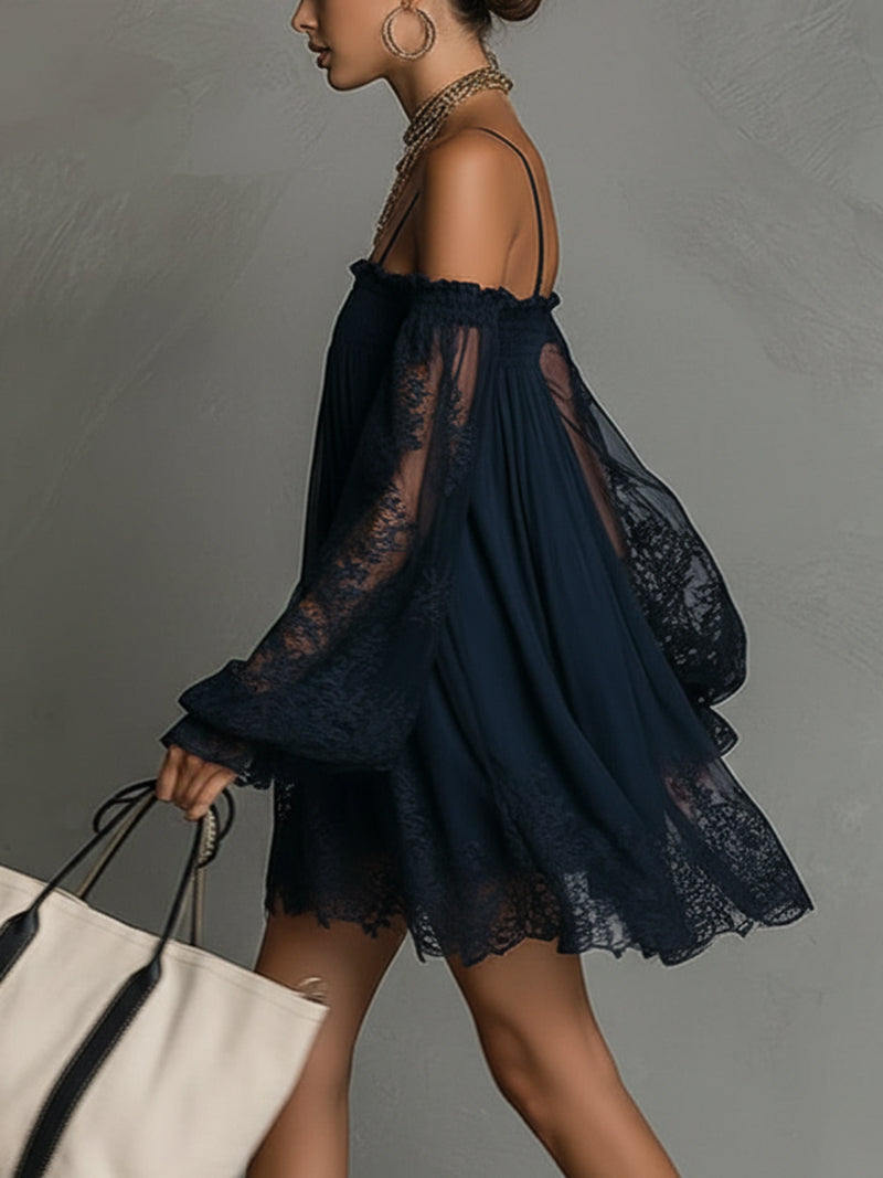 Side profile of navy off-shoulder dress with lace details, carried with white tote, in studio setting.