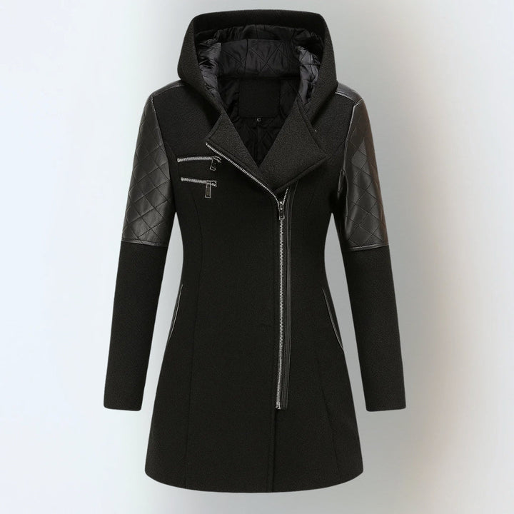 Black hooded winter jacket with black quilted sleeves and asymmetrical zipper, studio background.