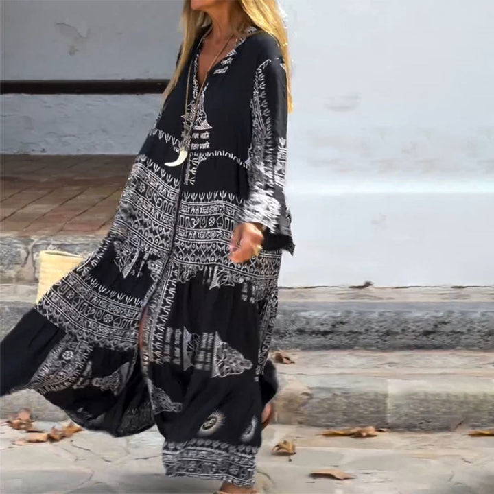 Emy – Printed Maxi Dress with V-Neck &amp; Bell Sleeves