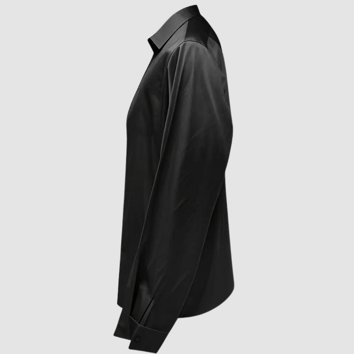 Side view of black satin blouse with long sleeves in a studio setting.