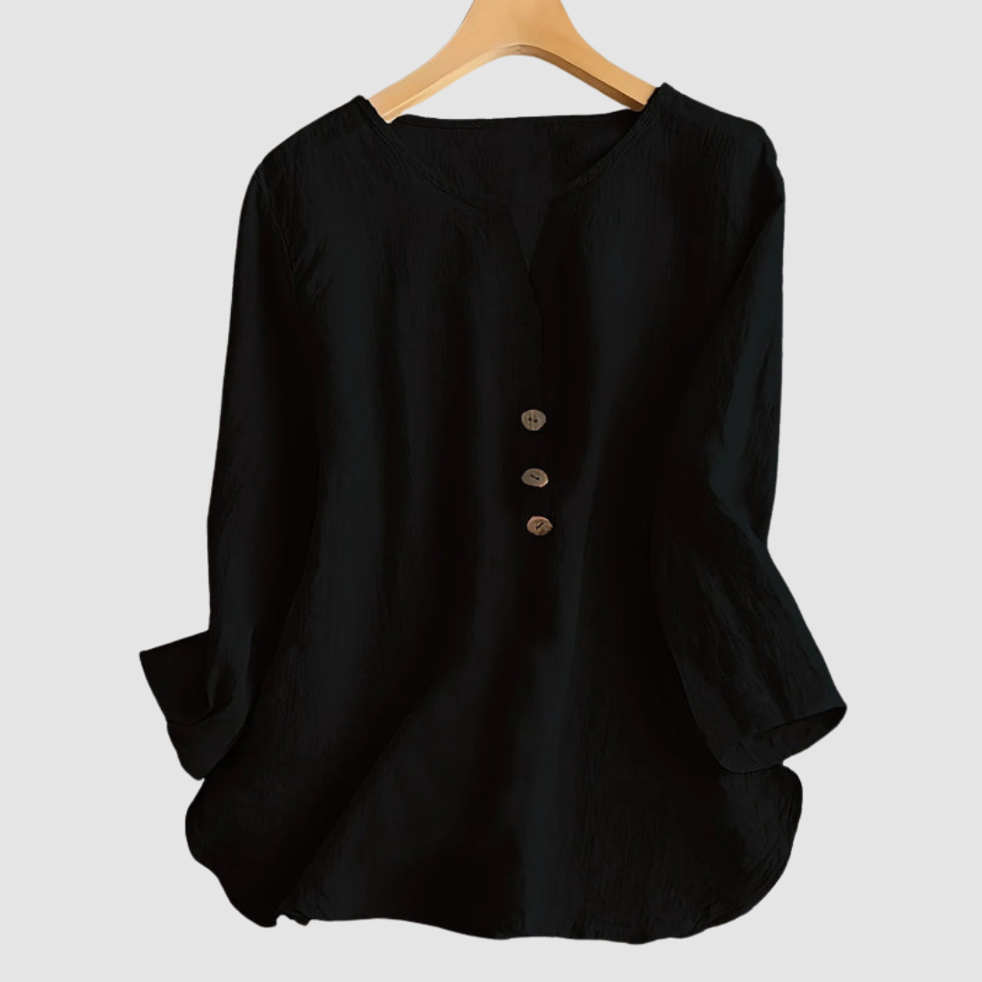 Black casual blouse with button detail displayed on a hanger against a plain background.