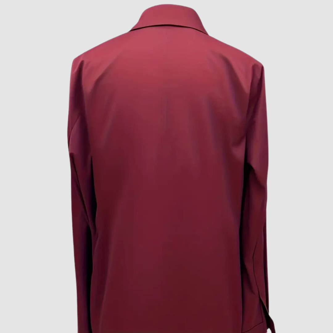 Back view of burgundy satin blouse with collar in a studio environment.