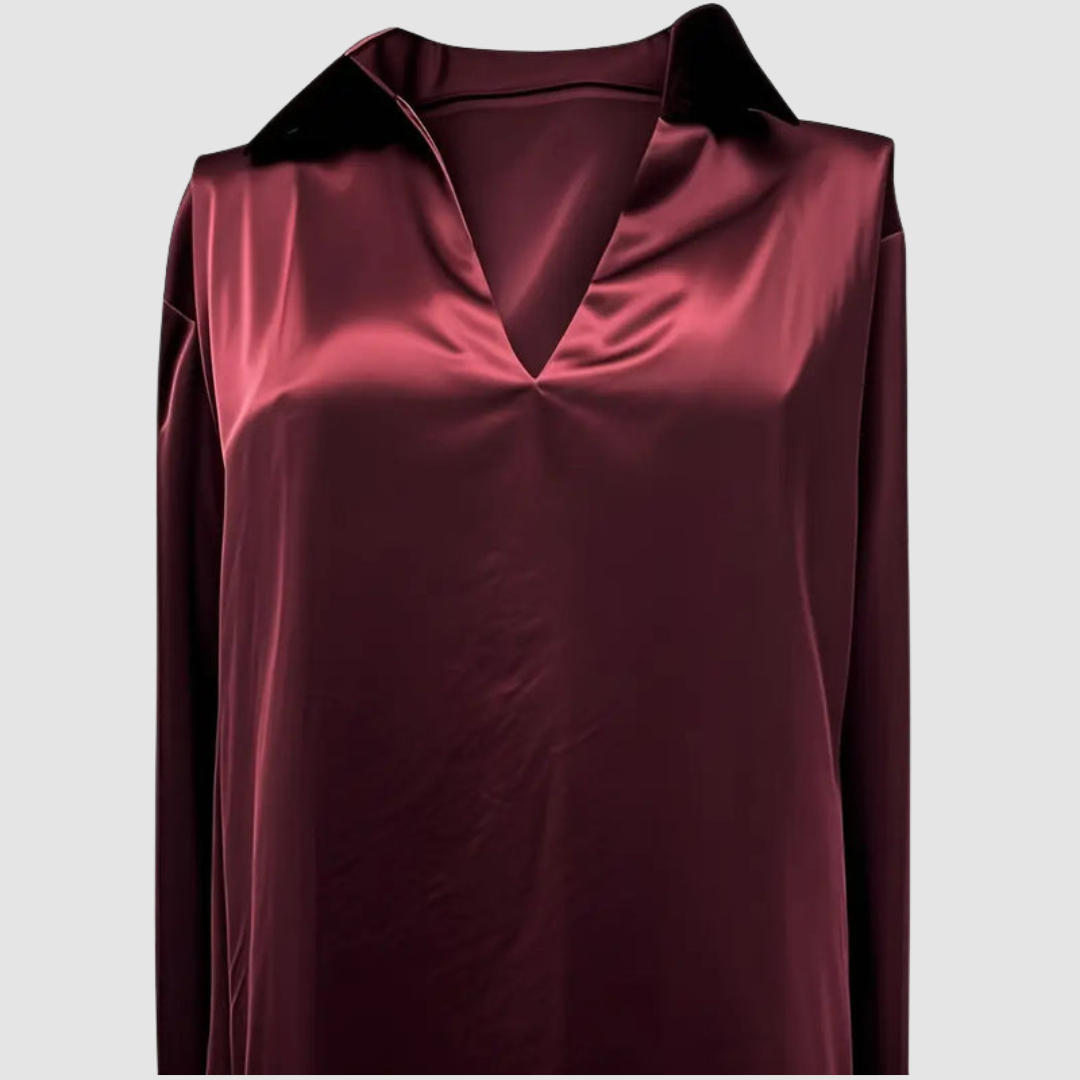 Burgundy satin blouse showing a straight front view in a studio environment.