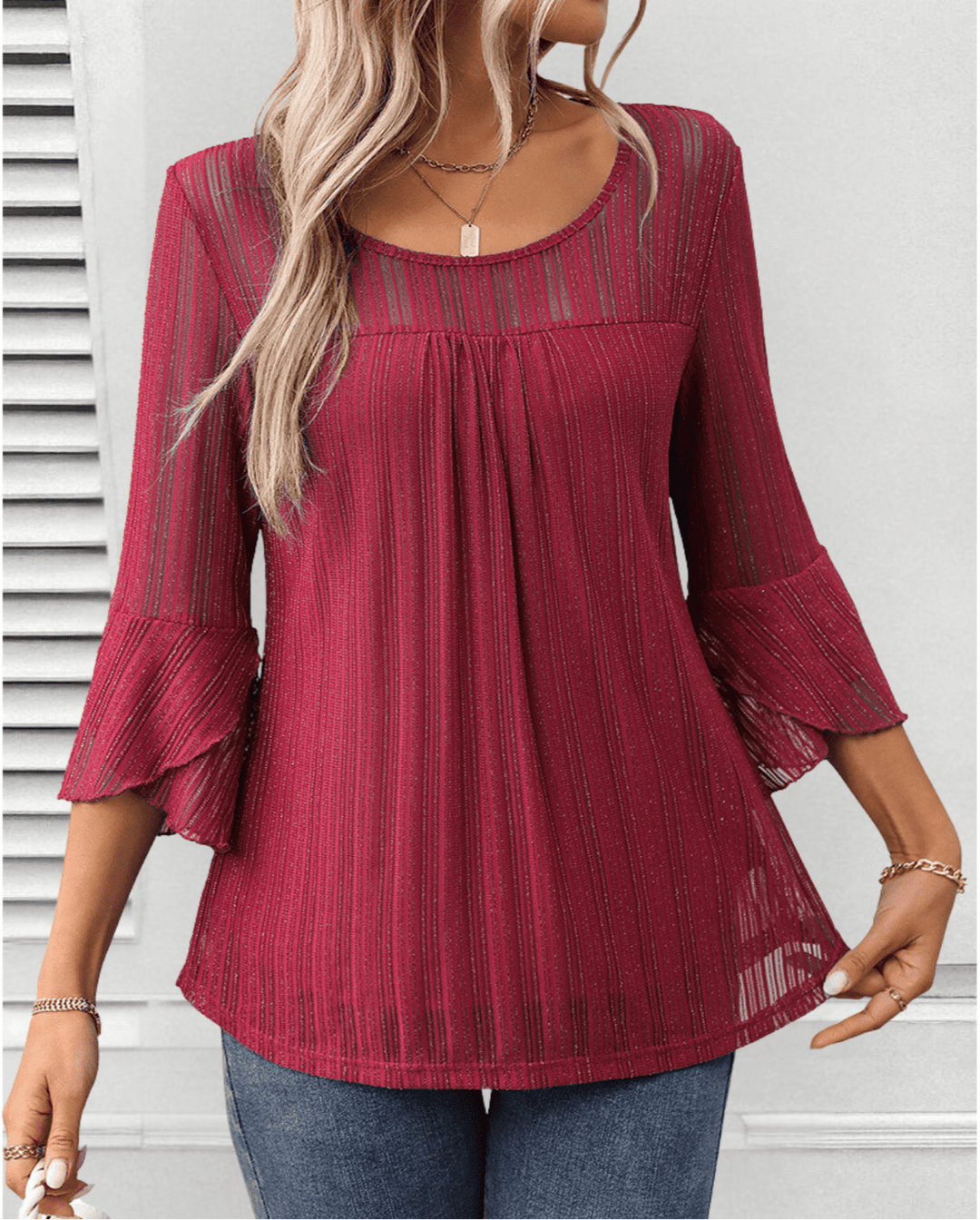 Larra – Pleated Blouse with Bell Sleeves