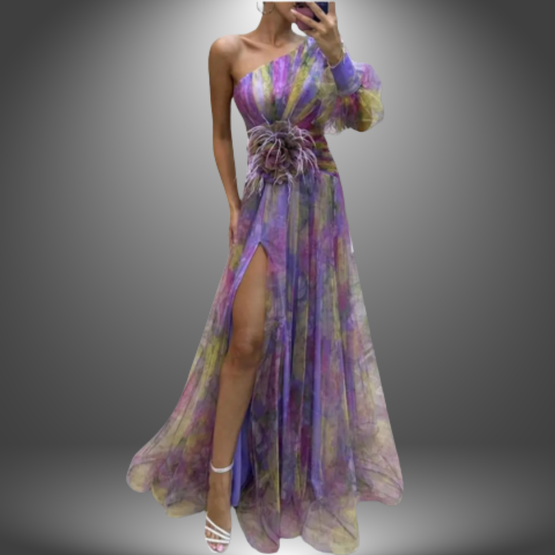 Elegant purple and yellow dress with one shoulder style, floral waist accent, and high slit in a gradient studio environment.