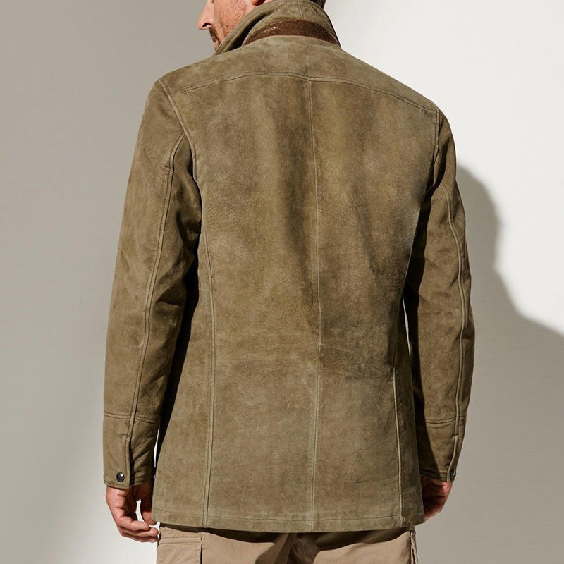 Back view of a vintage buckskin jacket with brown collar, buttoned cuffs, and detailed stitching in a studio setting.