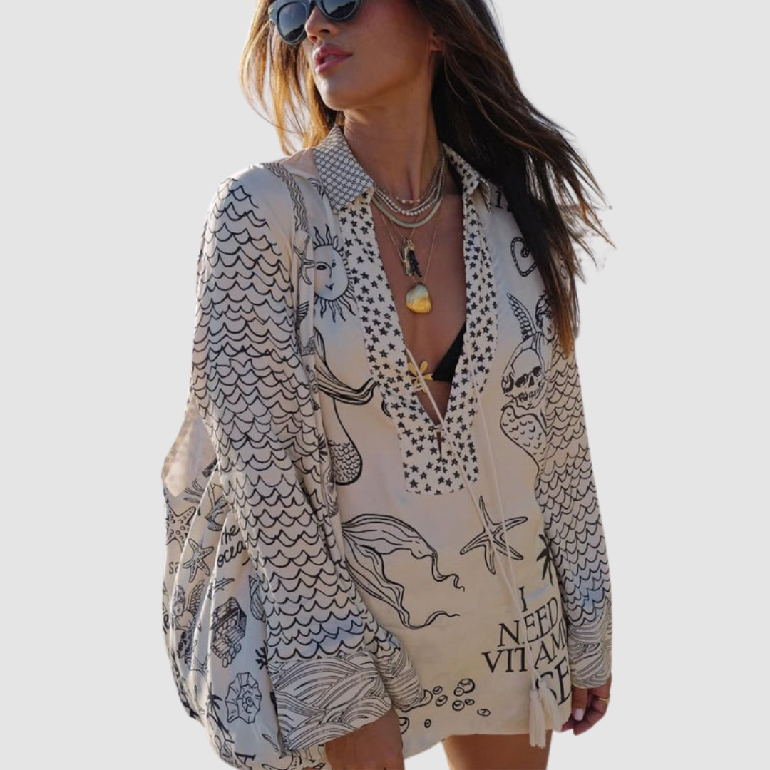 Model in stylish two-piece set with detailed design, grey background.