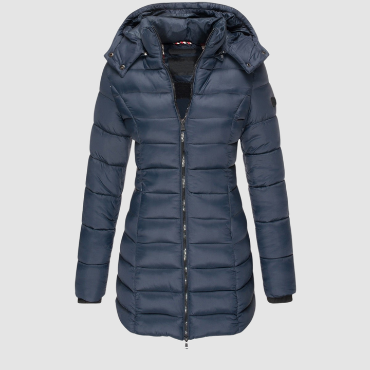 Elegant navy puffer jacket with a hood, displayed in a studio setting against a light gray background.