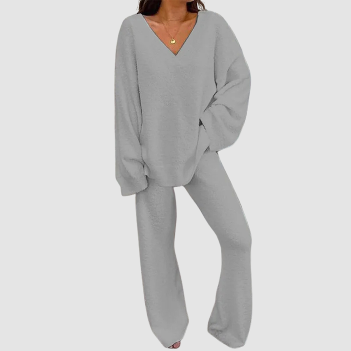 Gray V-neck long sleeve sweater and pants set on a person, posed against a plain white background.