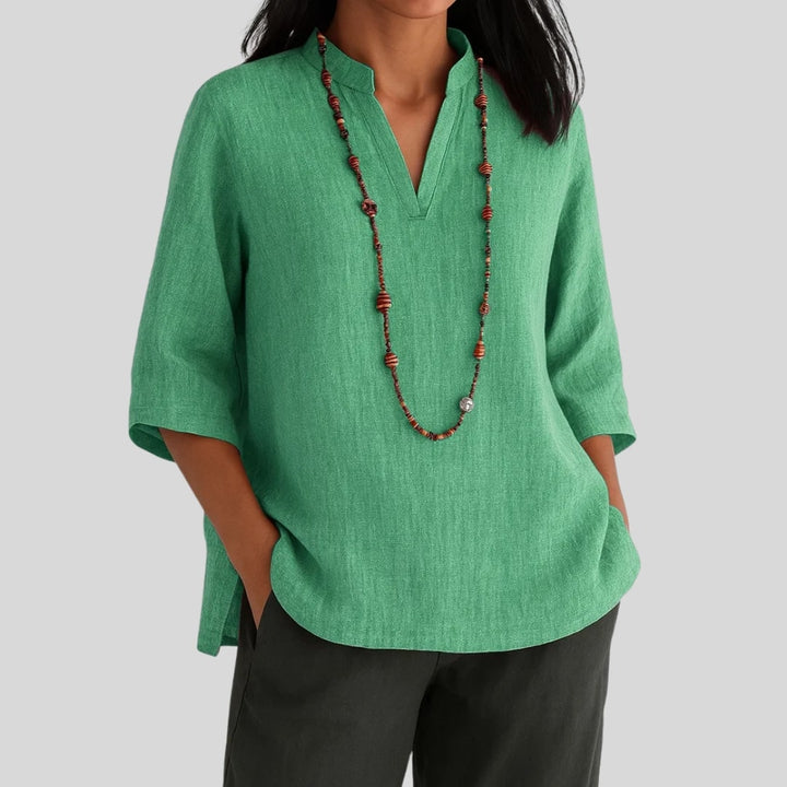 Elira – V-Neck Peplum Blouse with Keyhole Back