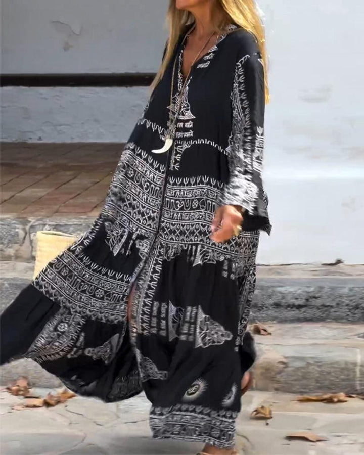 Emy – Printed Maxi Dress with V-Neck &amp; Bell Sleeves