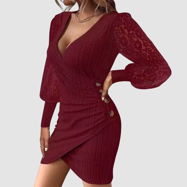 Red V-neck dress with lace sleeves, button details, studio setting.