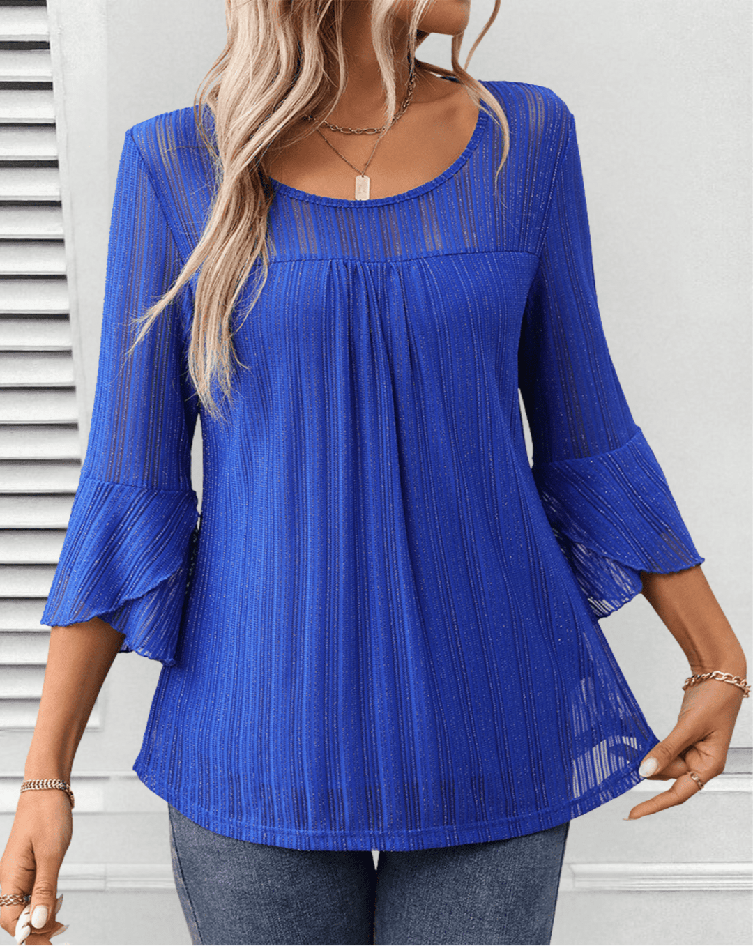 Larra – Pleated Blouse with Bell Sleeves