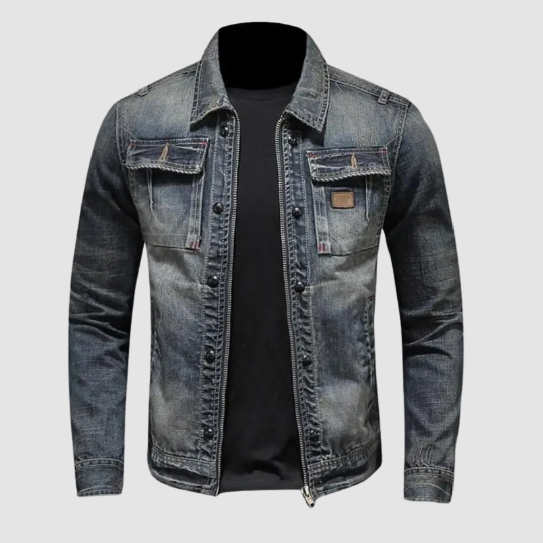 Front view of classic denim jacket with buttoned pockets on plain background.