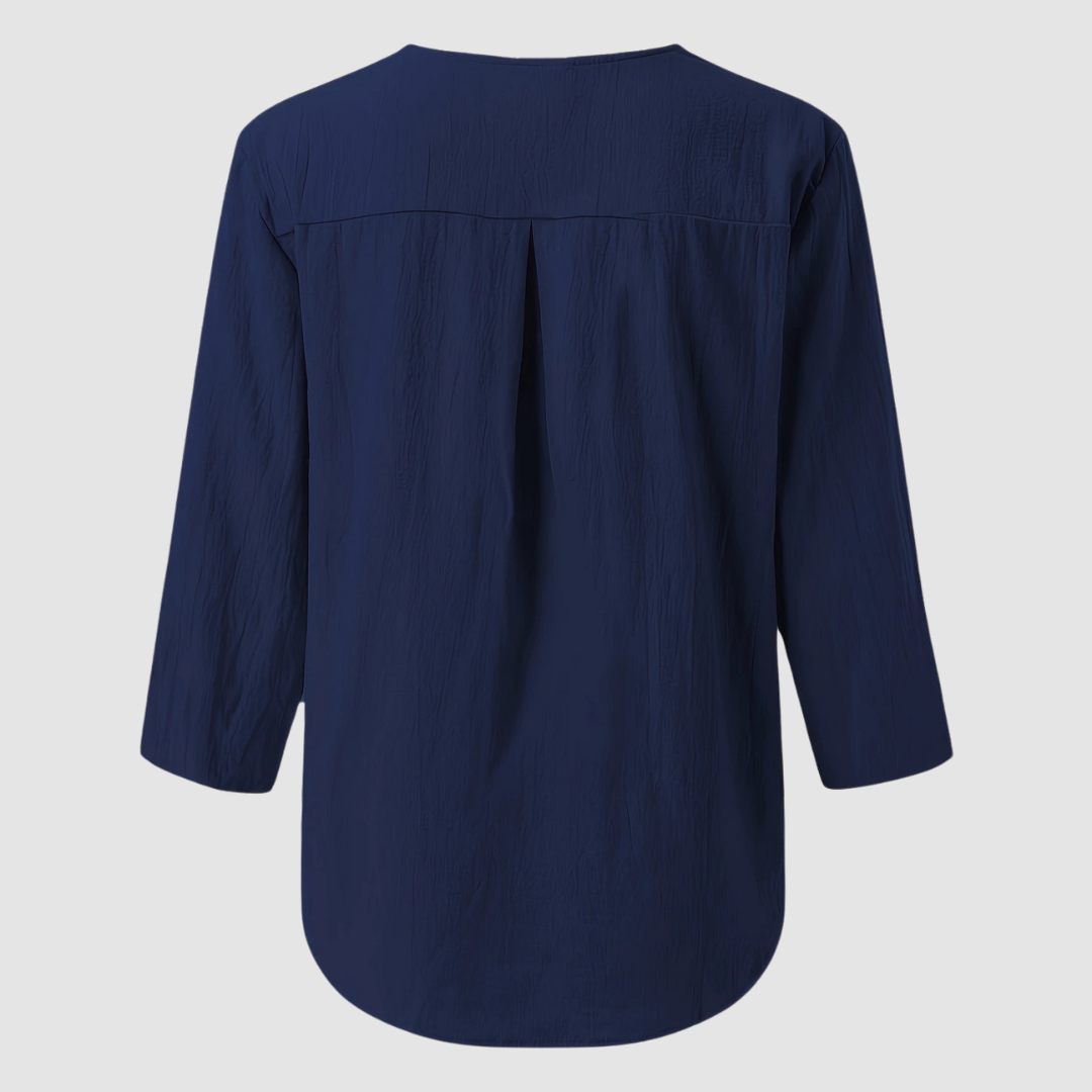 Back view of a navy casual blouse displayed flat against a plain background.