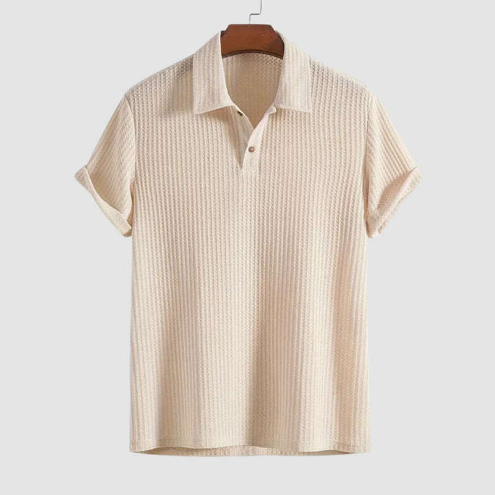 Light cream textured polo shirt on a hanger against a plain light gray background.