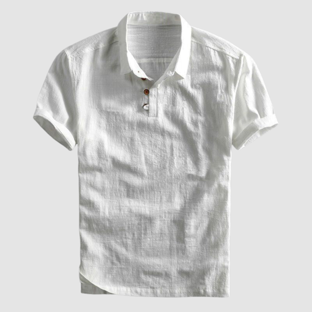 White short-sleeve polo shirt with button details, showcased against a light gray backdrop.
