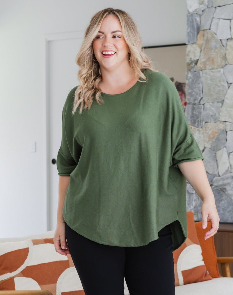 Mary – Batwing Knit Top with High-Low Hem