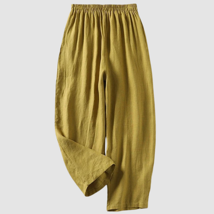 Yellow relaxed-fit pants with elastic waistband, styled on a light gray background.