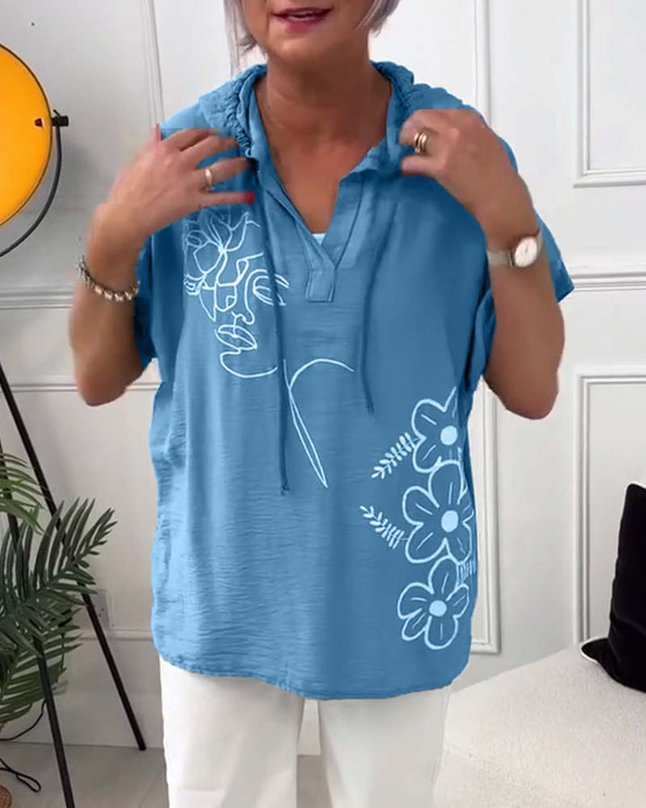Esme – Floral Hooded Blouse with Lace-Up Neckline