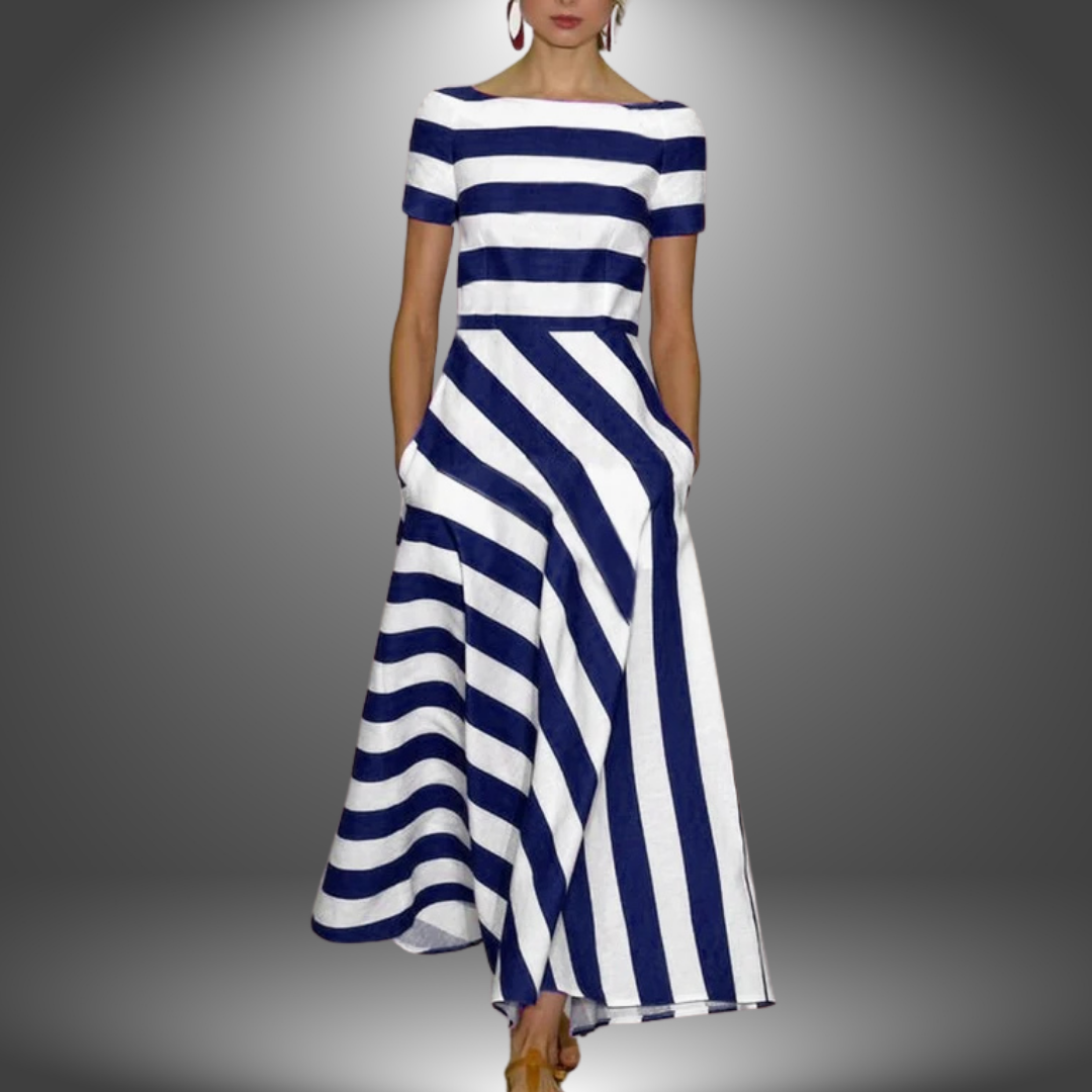 Blue and white striped long dress with short sleeves, photographed in a studio setting.