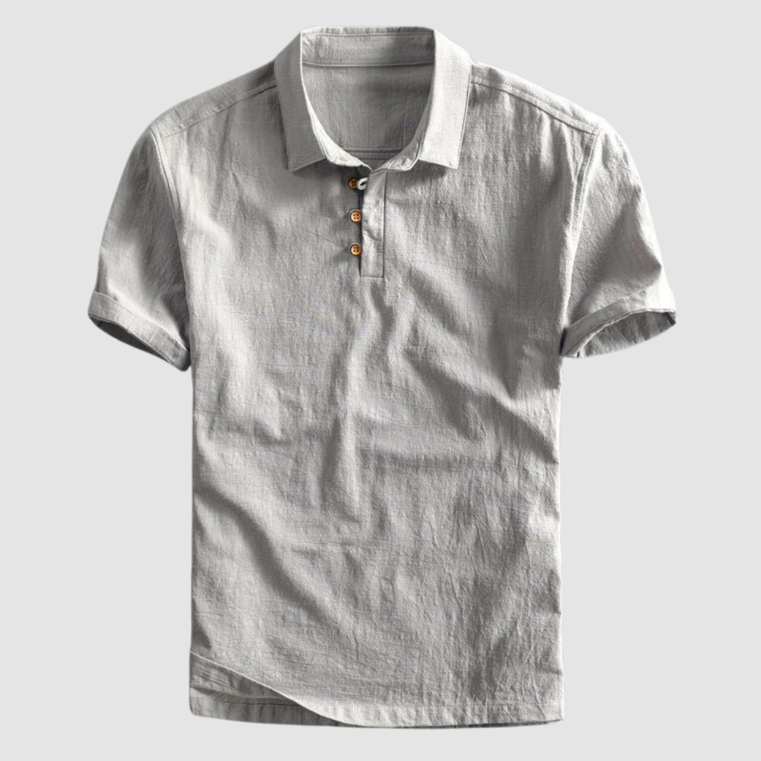Light gray short-sleeve polo shirt with buttons, set against a neutral light gray background.