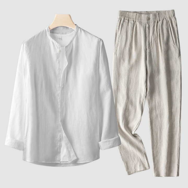 White shirt with beige pants set on a wooden hanger, displayed on a plain background.