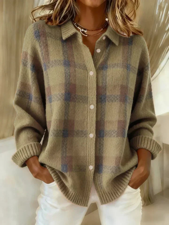 Beige plaid button-up shirt, cozy appearance, styled casually in an indoor scene.