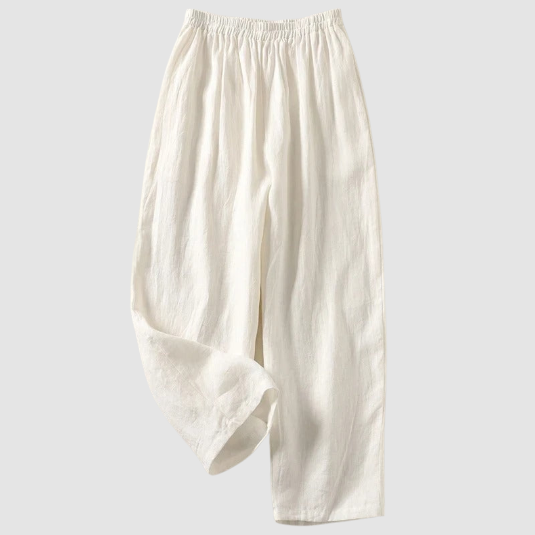 White relaxed-fit pants with elastic waistband, styled on a light gray background.