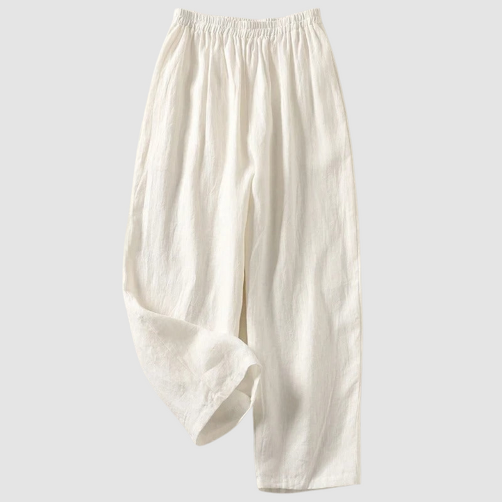 White relaxed-fit pants with elastic waistband, styled on a light gray background.
