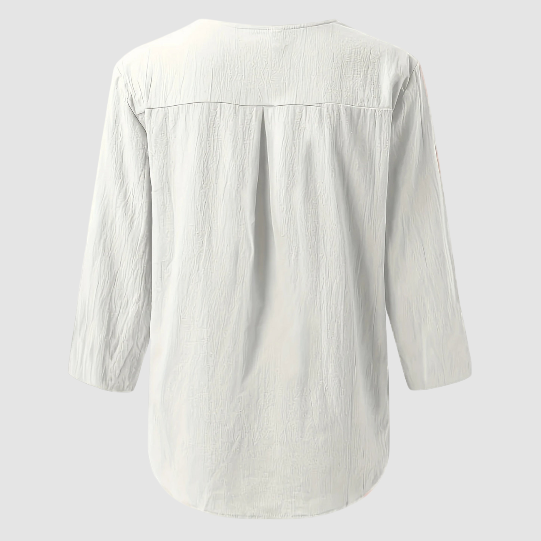 Back view of a white casual blouse displayed flat against a plain background.