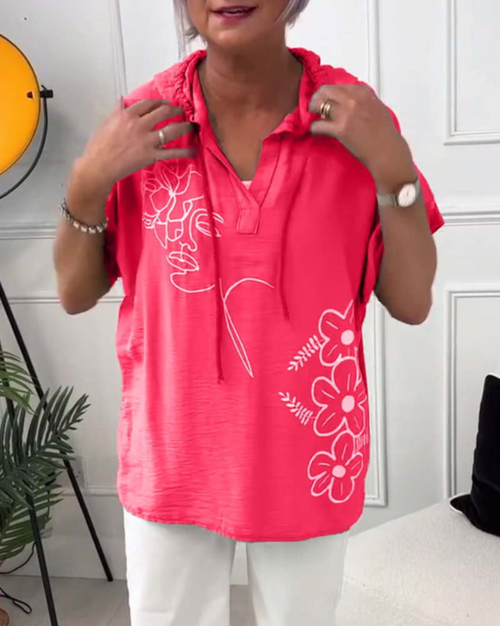 Esme – Floral Hooded Blouse with Lace-Up Neckline
