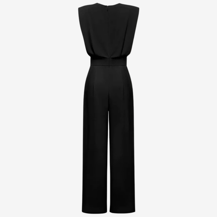 Back view of black sleeveless jumpsuit with wide legs in studio setting.