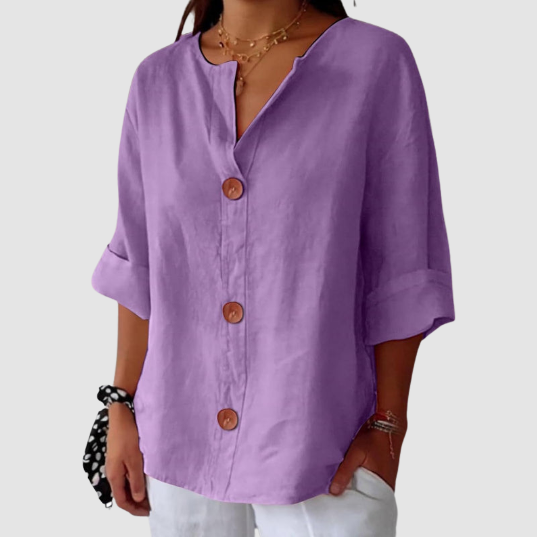 Purple casual blouse with button closure, half sleeves, on a plain white background.