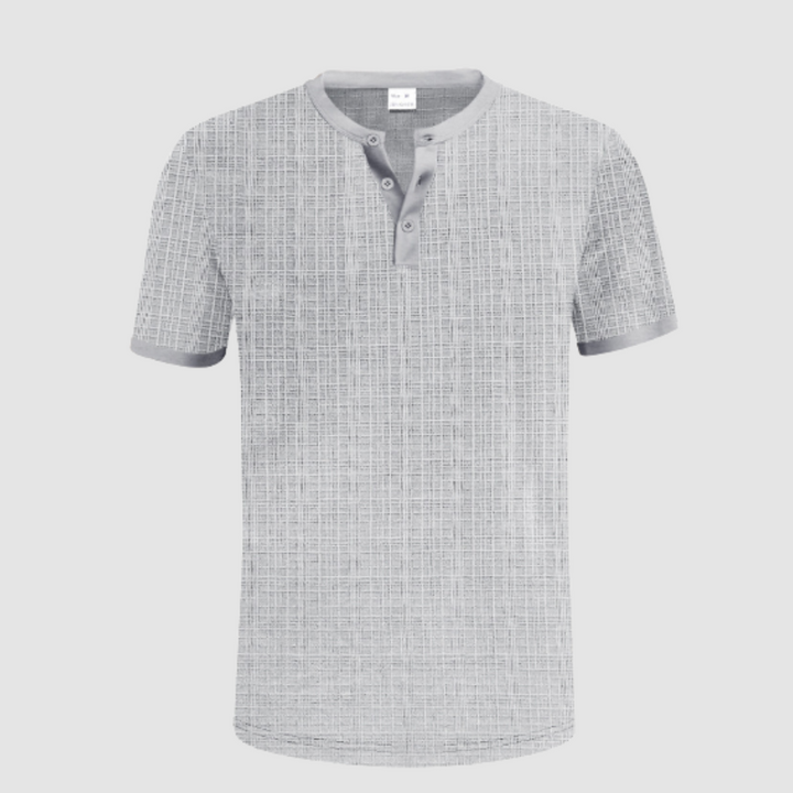 Light gray short-sleeve shirt with gridline pattern, buttoned Henley neckline, studio setting with white background.