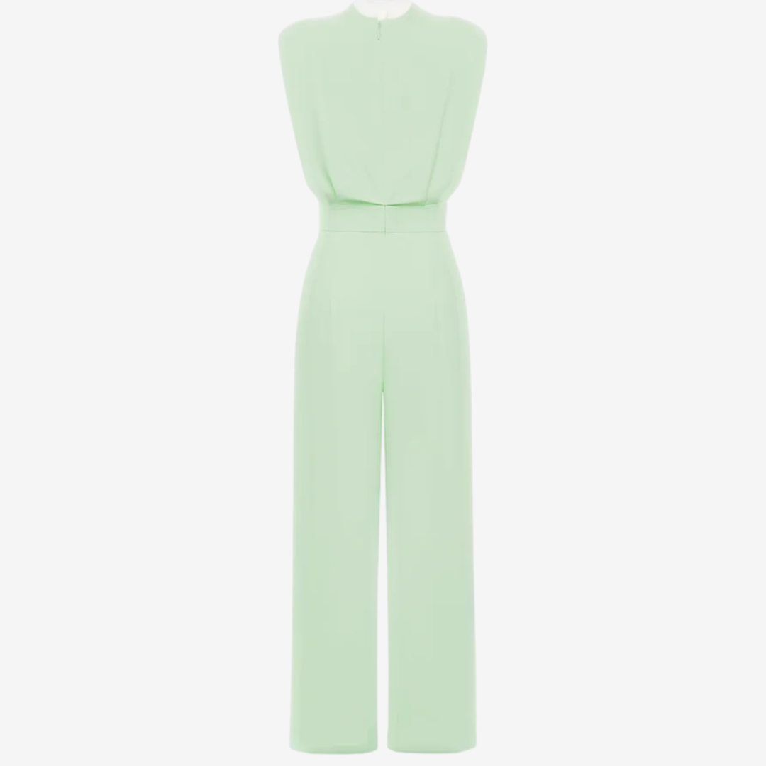 Back view of light green sleeveless jumpsuit with wide legs in studio setting.