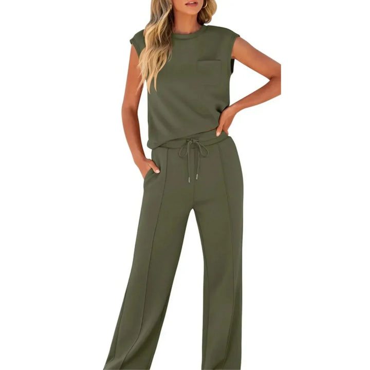 Olive green casual lounge set with sleeveless top and drawstring pants, studio setting.
