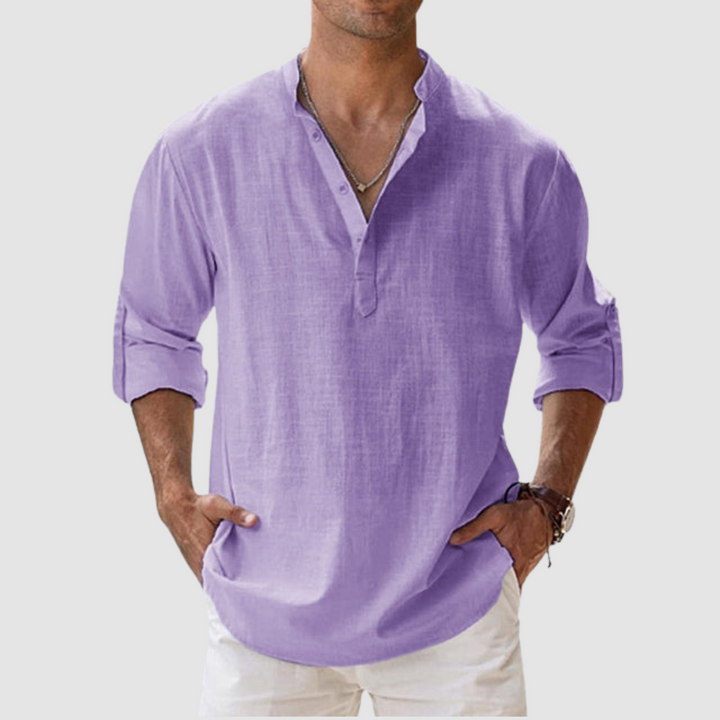 Lavender long-sleeve breathable shirt with banded collar, button placket, white pants in studio.