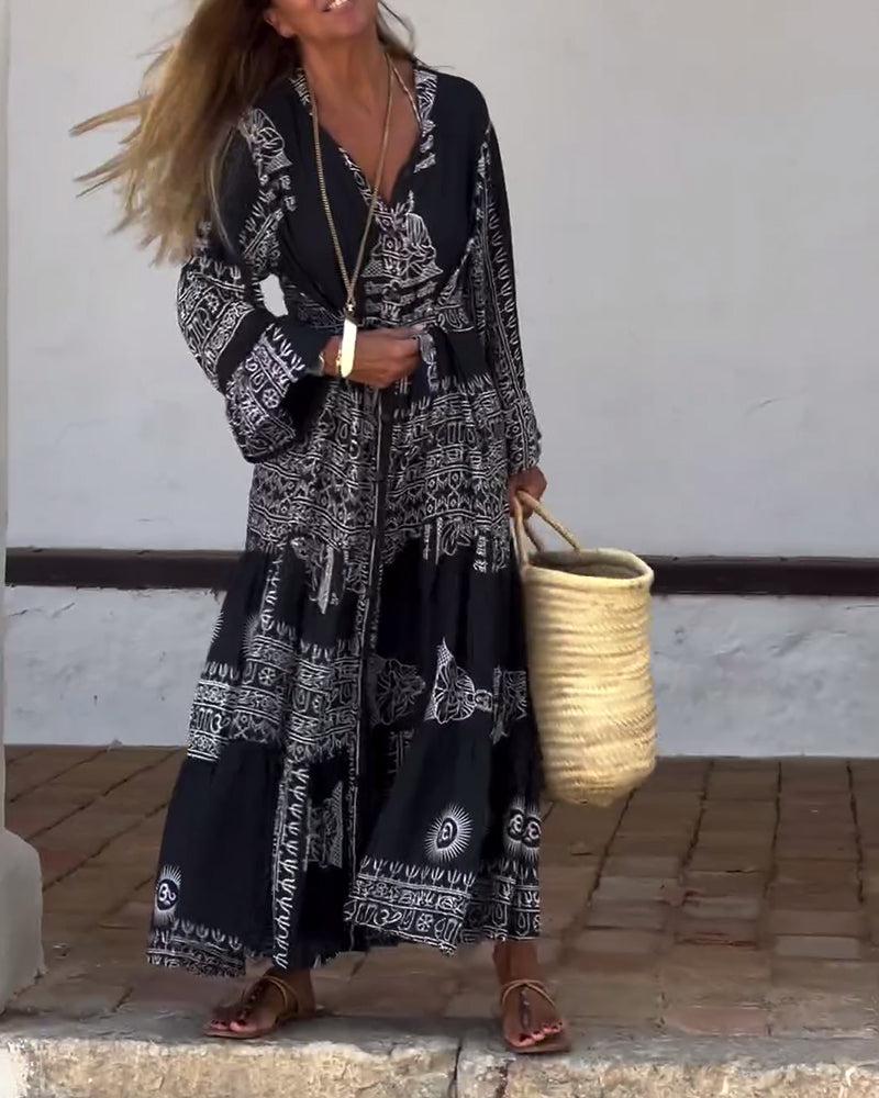 Emy – Printed Maxi Dress with V-Neck &amp; Bell Sleeves