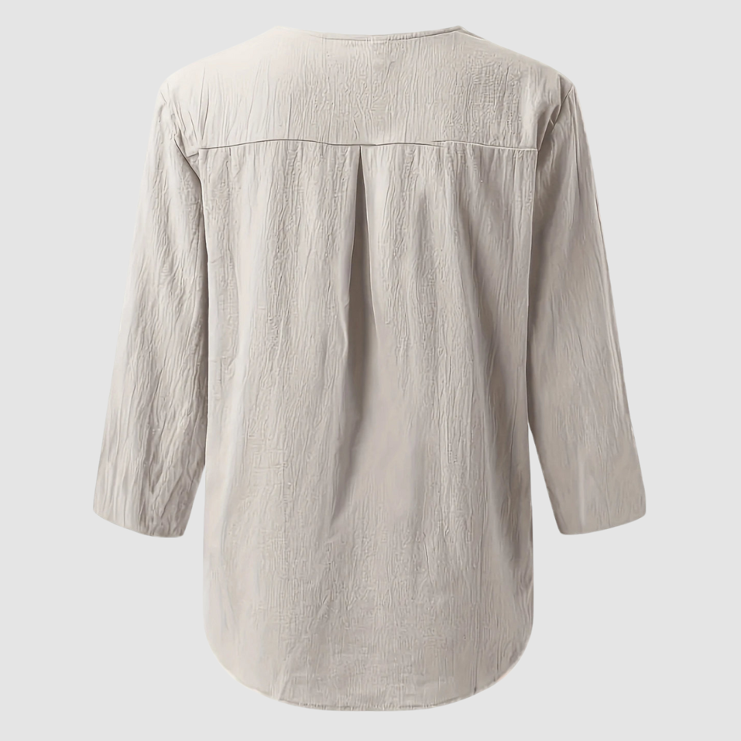 Back view of a beige casual blouse displayed flat against a plain background.