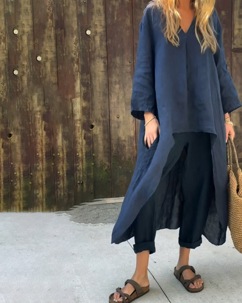 Navy chic set paired with a woven bag and sandals, rustic wall backdrop.
