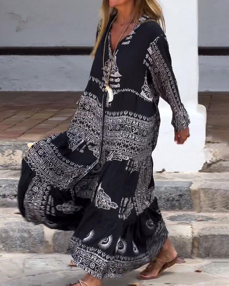 Emy – Printed Maxi Dress with V-Neck &amp; Bell Sleeves