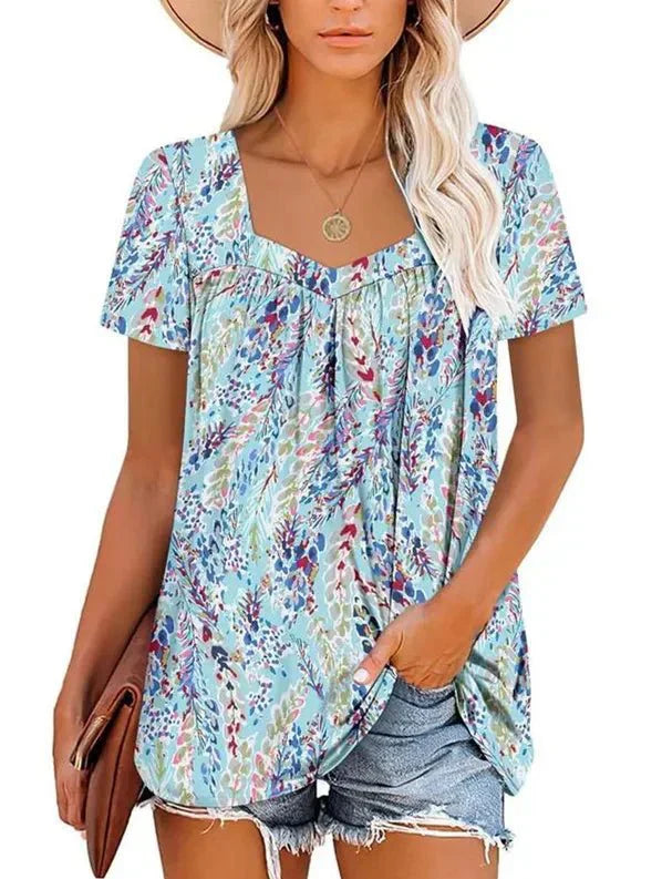 Lory – Pleated Floral Shirt with Curved Hem