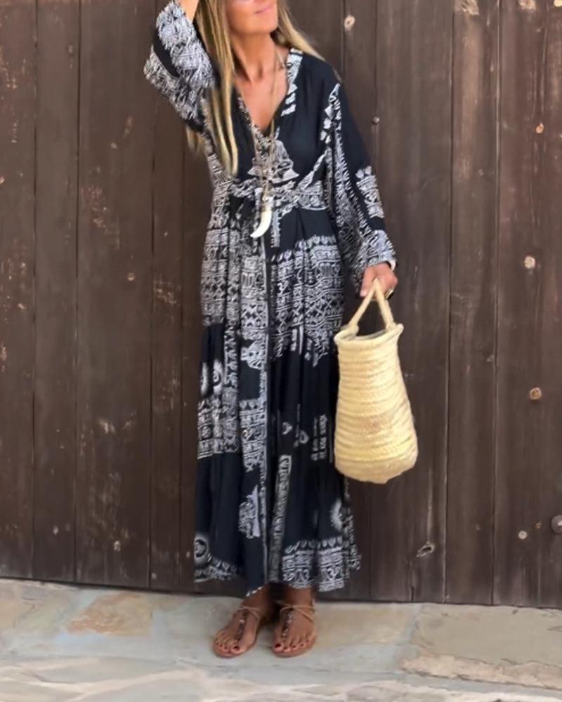 Emy – Printed Maxi Dress with V-Neck &amp; Bell Sleeves