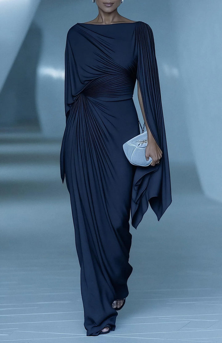 Stylish navy pleated drape maxi dress, paired with a chic white clutch, set in a sleek and contemporary blue-toned environment.