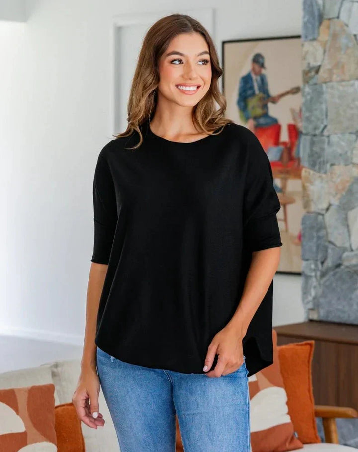 Mary – Batwing Knit Top with High-Low Hem
