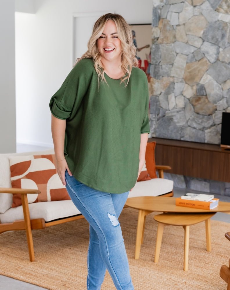 Mary – Batwing Knit Top with High-Low Hem