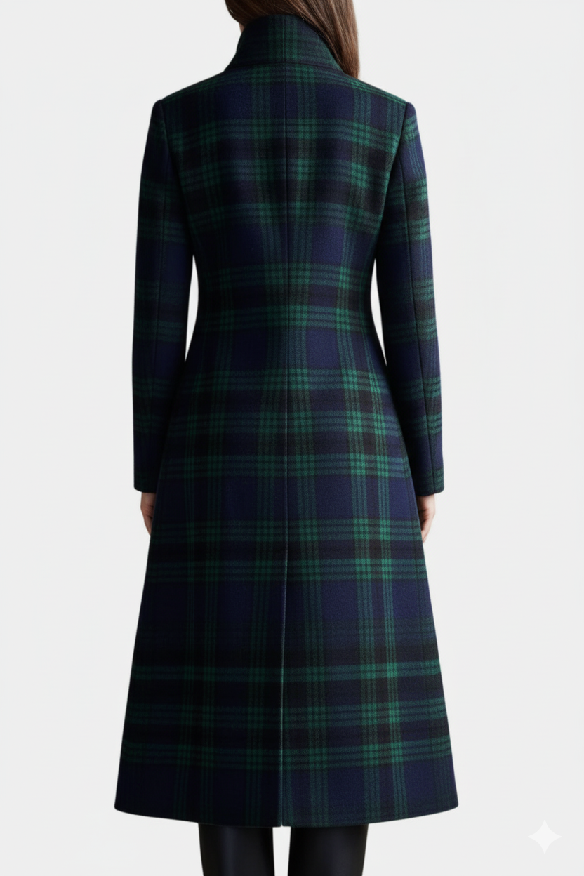 Back view of a long plaid coat in dark green and navy, highlighting a structured fit, showcased in a studio environment.