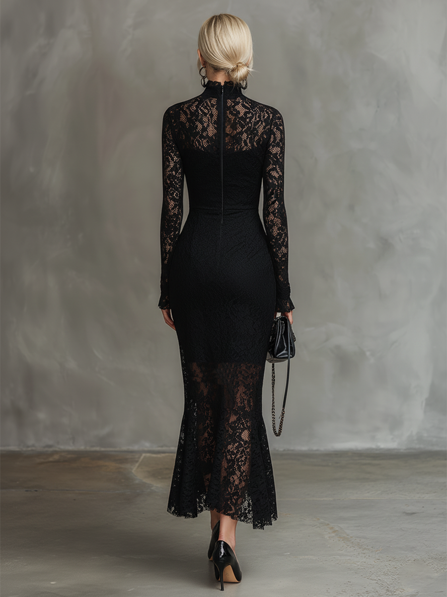 Rear view of a black lace maxi dress with long sleeves, worn in a studio setting.
