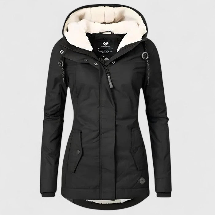 Black winter coat with hood, warm interior lining, and button accents in a studio setting.